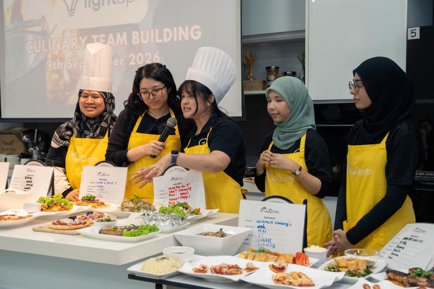 Light Up 7 team presenting their dishes at the MasterChef team building challenge